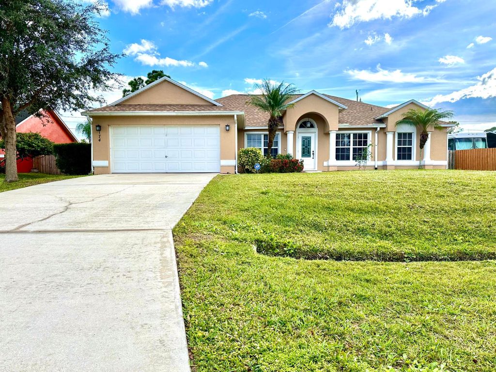 Photo of 174 SW Sea Lion Road, Port Saint Lucie, FL 34953 (MLS # B26013065)