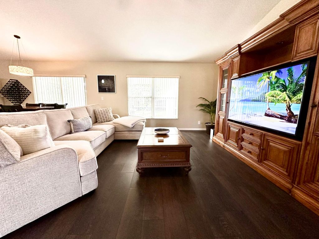 Photo of 174 SW Sea Lion Road, Port Saint Lucie, FL 34953 (MLS # B26013065)