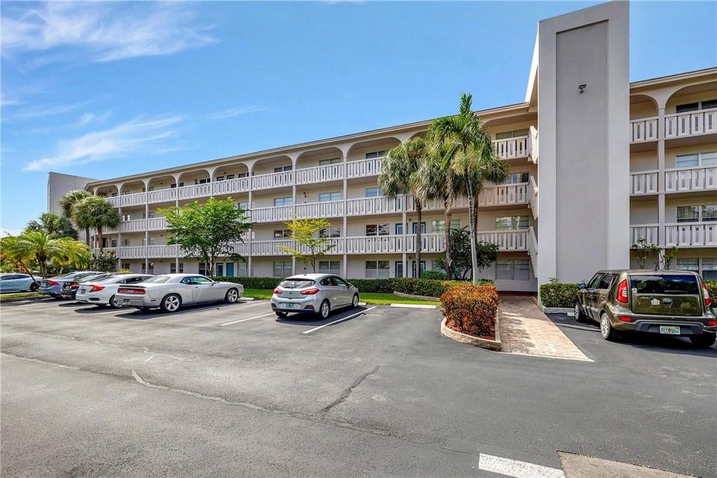 Photo of 2001 Granada Dr #L1, Coconut Creek, FL 33066 (MLS # F10383063)