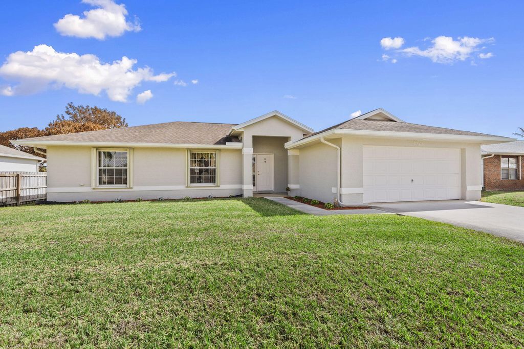 Photo of 2743 SW District Ave, Port Saint Lucie, FL 34953 (MLS # B26001188)