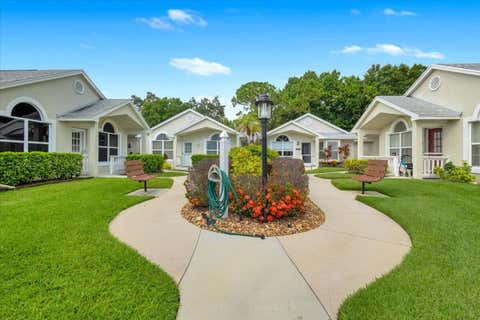 Photo of 1189 NW Lombardy Drive, Port Saint Lucie, FL 34986 (MLS # B26050164)
