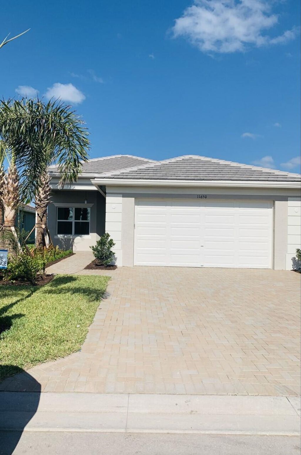Photo of 11650 SW Moon River Way, Port Saint Lucie, FL 34987 (MLS # R10803319)