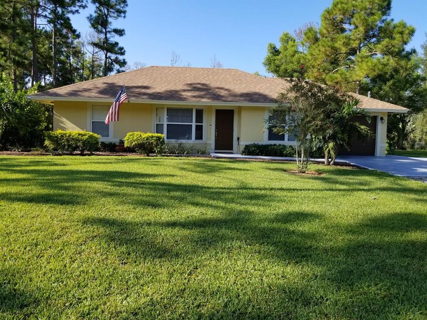 Multiple offers received, best and final offer by 5pm Wednesday August 28th, no showings at this time.
No HOA!! A Beautiful home on one acreage tree covered lot with canal in front of the home. This house is well maintained with a new roof and new air conditioner installed in 2017. The kitchen has granite countertops and stainless steel appliances with plenty of cabinets for storage. There is a 1 car garage with the washer and dryer and plenty of parking in the driveway. The property is completely fenced with a gate lock at the entrance for added security. The owner has meticulously maintained the home with pride and this home will not last long on the market, a must see and a great price for the beautiful home and your backyard oasis with plenty of room for a pool.