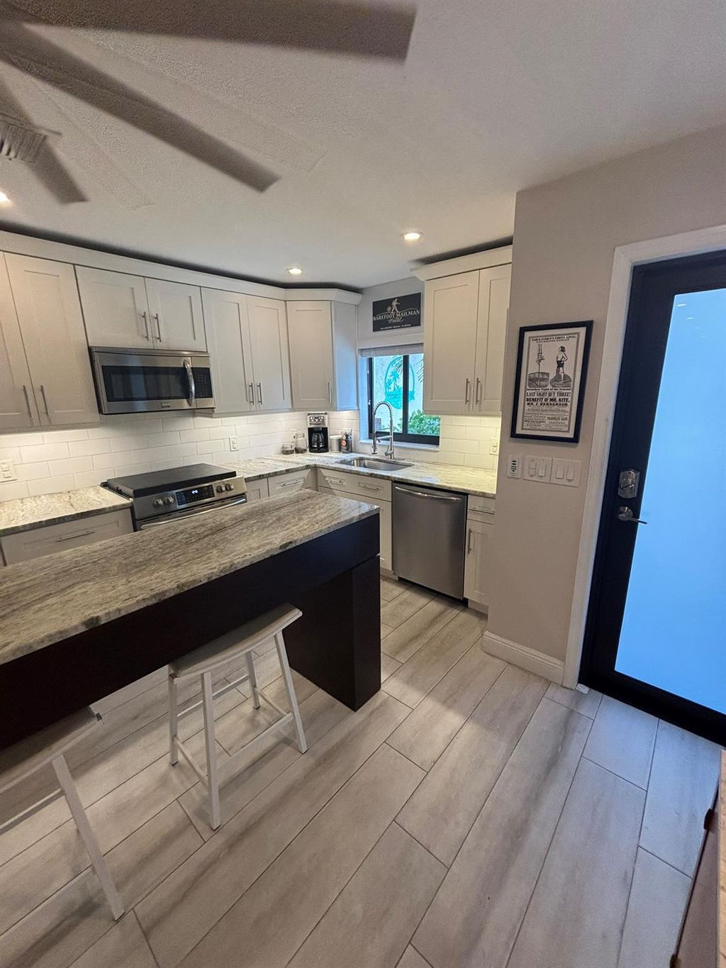 Photo of 385 SE 17th Avenue #385, Deerfield Beach, FL 33441 (MLS # F10550833)