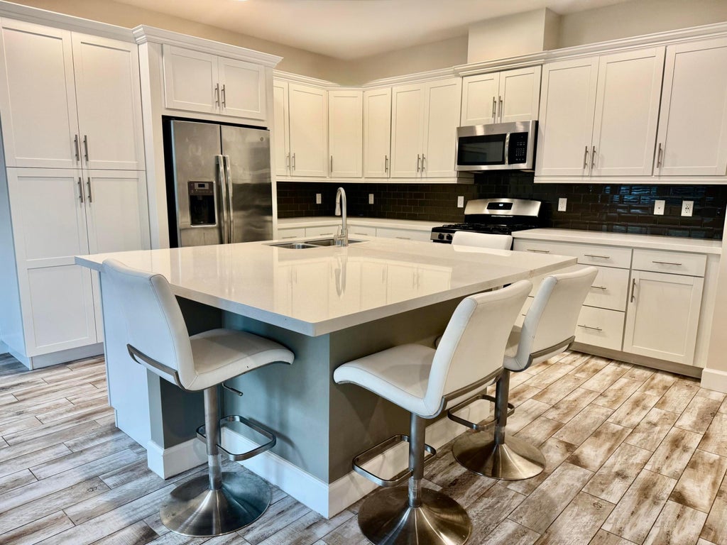 Photo of 2950 NW 124th Way, Sunrise, FL 33323 (MLS # B26066960)
