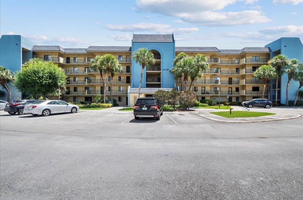 Photo of 2786 Tennis Club Drive #102, West Palm Beach, FL 33417 (MLS # B26019651)