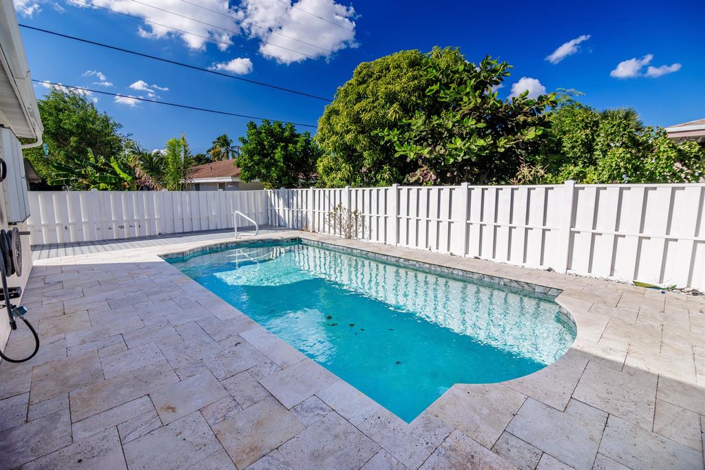 Photo of 527 W Jasmine Drive, Lake Park, FL 33403 (MLS # R11141609)