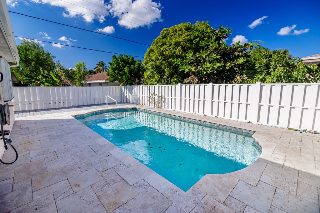 Photo of 527 W Jasmine Drive, Lake Park, FL 33403 (MLS # R11141609)