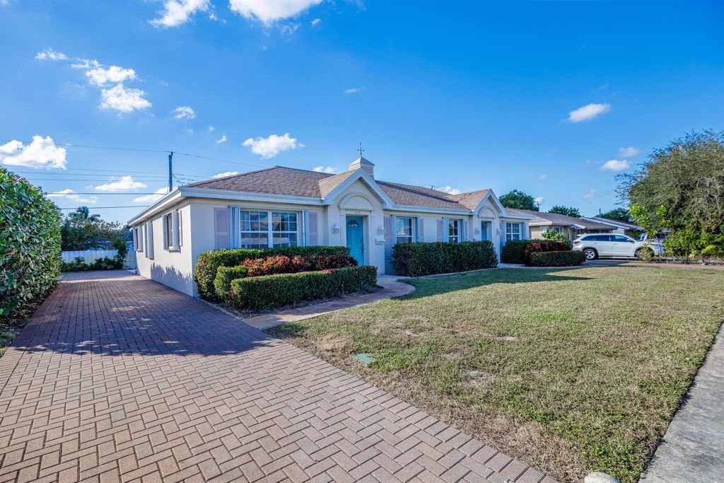 Photo of 527 W Jasmine Drive, Lake Park, FL 33403 (MLS # R11141609)