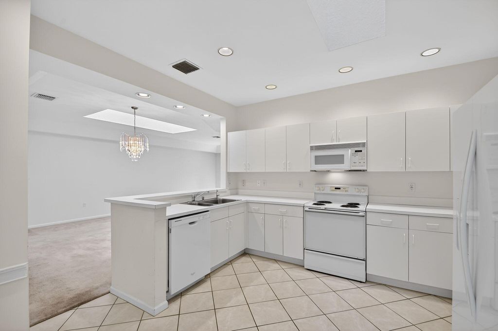 Photo of 12574 Crystal Pointe Dr #C, Boynton Beach, FL 33437 (MLS # B26001078)