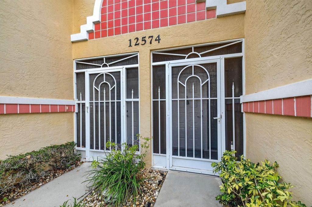 Photo of 12574 Crystal Pointe Dr #C, Boynton Beach, FL 33437 (MLS # B26001078)