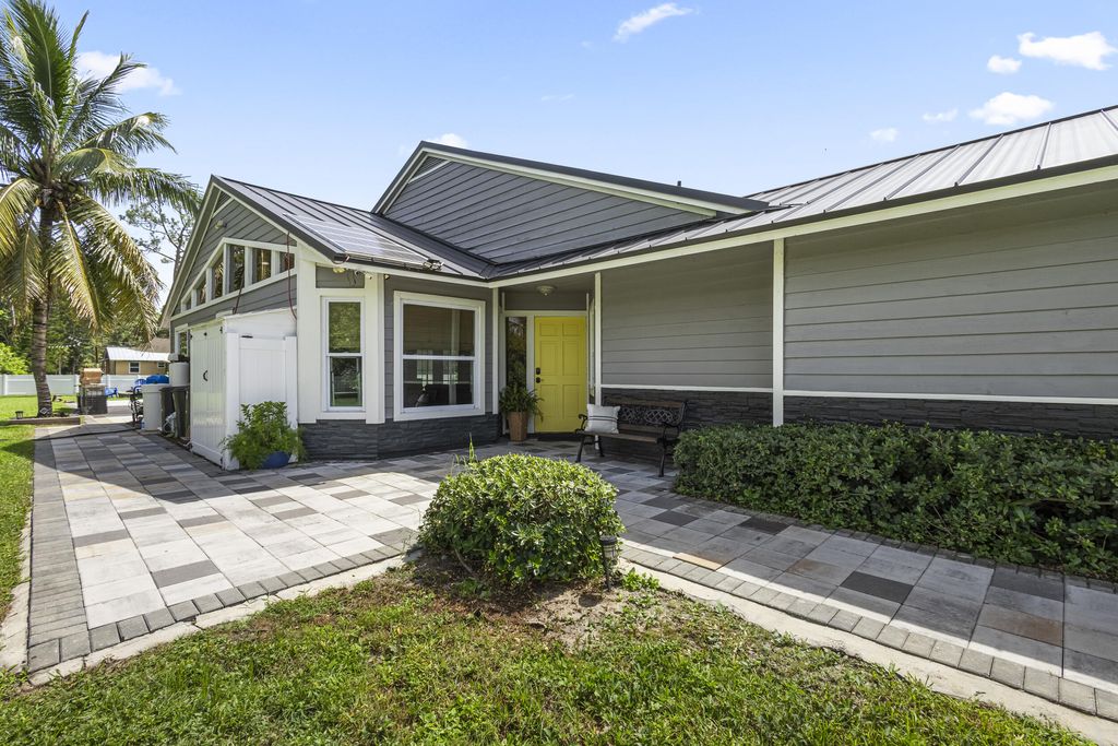 Photo of 12397 Tangerine Blvd, West Palm Beach, FL 33412 (MLS # R11006309)