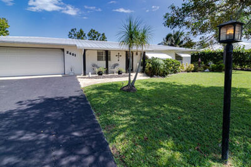 Photo of 2481 NW Everglades Boulevard, Stuart, FL 34994 (MLS # R10926419)