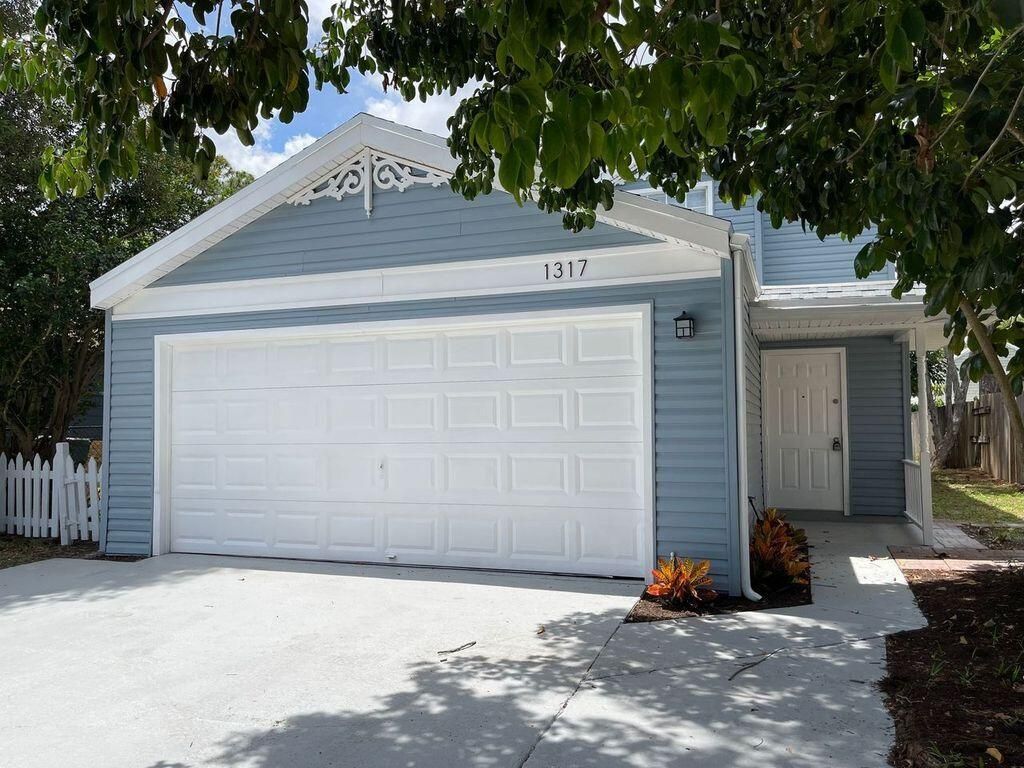 Photo of 1317 Strawberry Lane, West Palm Beach, FL 33415 (MLS # R10793063)