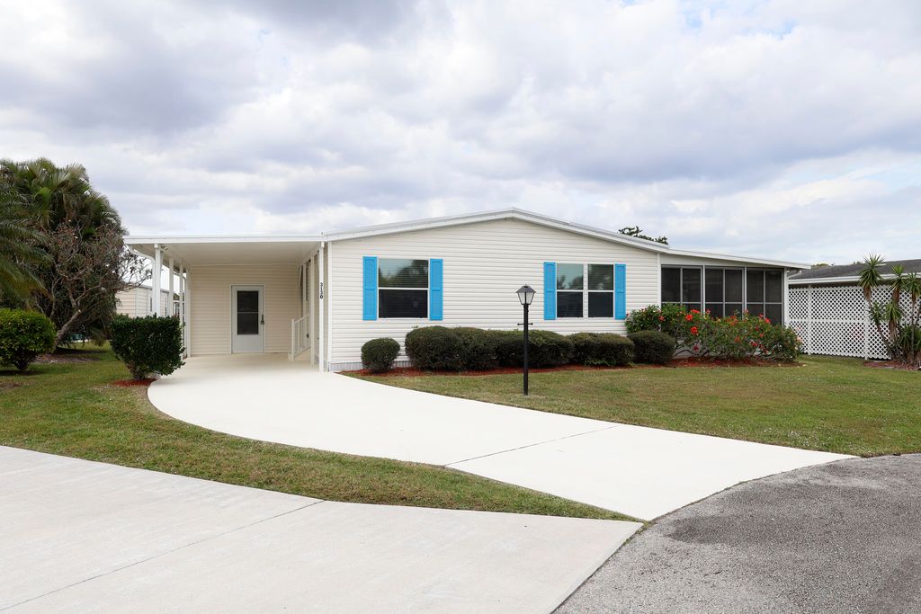 Photo of 3130 Crabwood Lane, Port Saint Lucie, FL 34952 (MLS # R10962346)