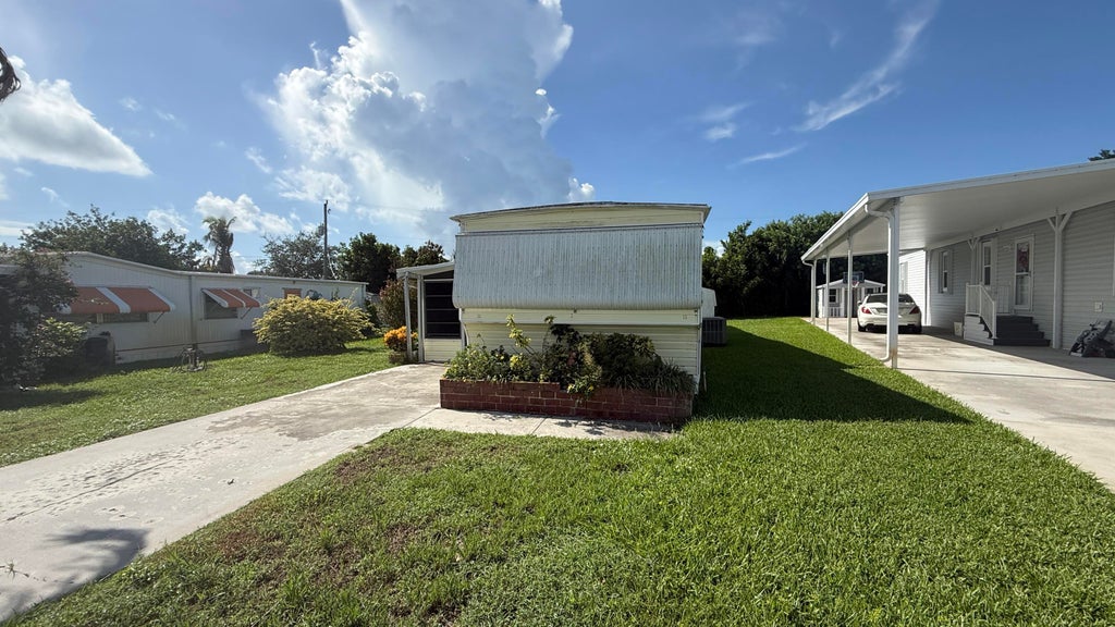 Photo of 11055 SE FEDERAL HWY 97 Highway #97, Hobe Sound, FL 33455 (MLS # B26071130)