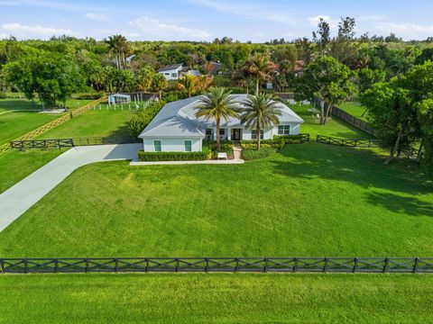 Photo of 9301 154th Road N, Jupiter, FL 33478 (MLS # B26003522)