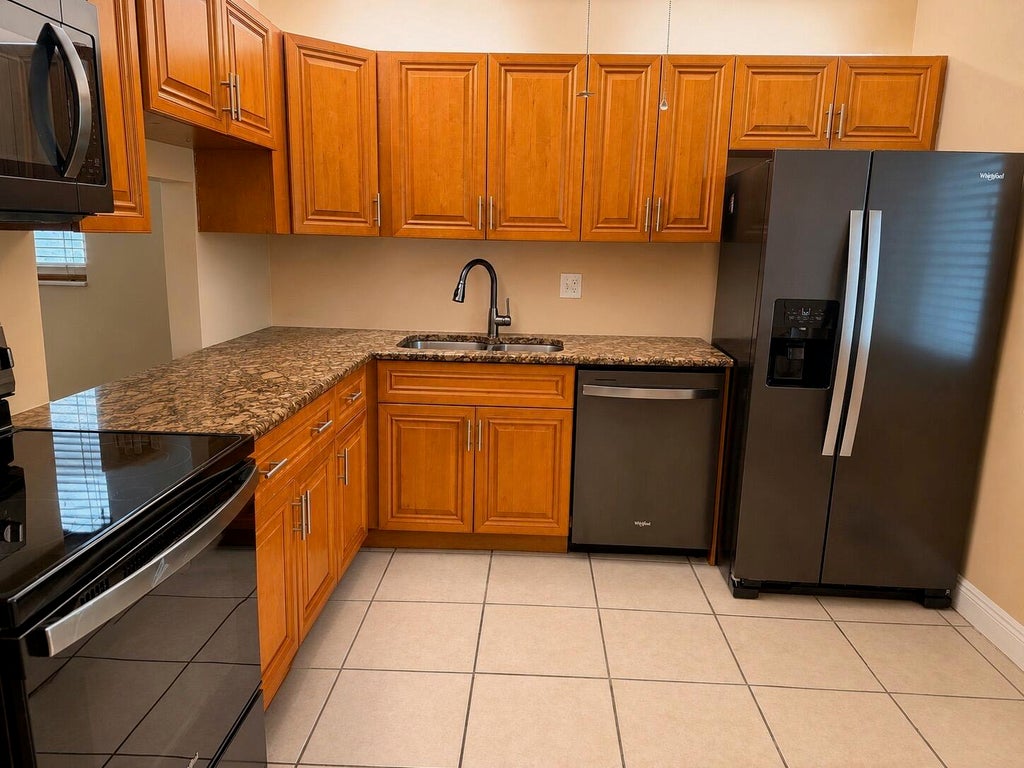 Photo of 449 Golden River Drive, West Palm Beach, FL 33411 (MLS # B26021999)