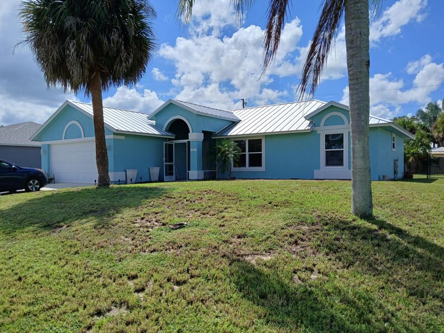 Well Maintained 3 bedroom 2 bath 2 car garage  
inground pool fenced back yard. Split bedrooms, both Bathrooms newly updated. Freshly painted interior and exterior. New metal room. hurricane impact windows. Screened lanai overlooks pool. Tankless water heater