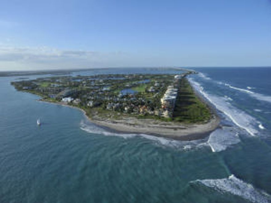 Sailfish Point's unique location directly on the Atlantic Ocean and St. Lucie Inlet at the Southern tip of Hutchinson Island, makes it a community like no other. This 532-acre island community of 520 homes offers every amenity, makes every option available, then stands ready to help you enjoy it. Residents enjoy five miles of pristine shoreline, oceanfront Jack Nicklaus ''Signature'' golf, elegant beachfront country club and full-service marina with immediate ocean access. Resort-style amenities include state-of-the-art fitness complex, spa/salon, eight impeccably maintained Har-Tru tennis courts and the ultimate in private security. Sailfish Point combines all this with the opportunity to live in one of the world’s most naturally beautiful settings.