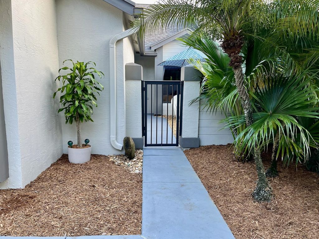 Photo of 2404 Landings Boulevard, Greenacres, FL 33413 (MLS # R11005907)