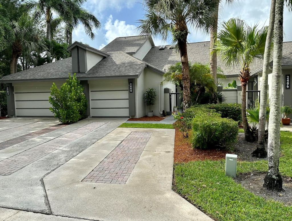Photo of 2404 Landings Boulevard, Greenacres, FL 33413 (MLS # R11005907)