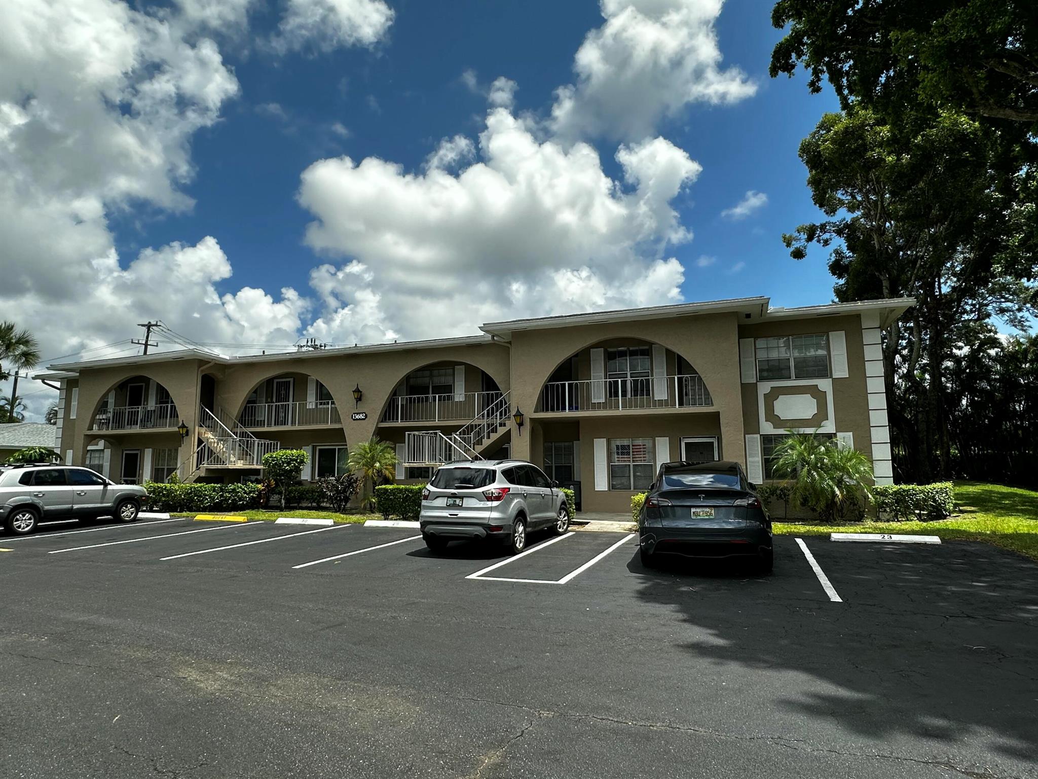 Updated 2 bedroom, 2 bathroom corner unit in Palm Greens of Delray. This updated condo has new vinyl flooring, baseboards and 12 x 24 tiles in both bathrooms. New light fixtures, sinks, faucets and much more. The kitchen has new Marble Backsplash, oversized sink and faucet. Living room is very spacious with added enclosed patio with plenty of windows for direct light. The master bedroom has a walk in closet, large quartz vanity countertop with make up area. The community has a resort style clubhouse, 2 pools, tennis pro on site, lap pool, billiards, 9 tennis courts, 2 gyms, library and to top it off a Cafe. Close to great restaurants, golf courses and plenty of shopping. Don't miss this great opportunity to live in Delray Beach!