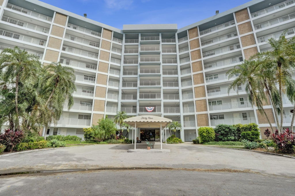 Photo of 2940 N COURSE Drive #401, Pompano Beach, FL 33069 (MLS # B26088955)