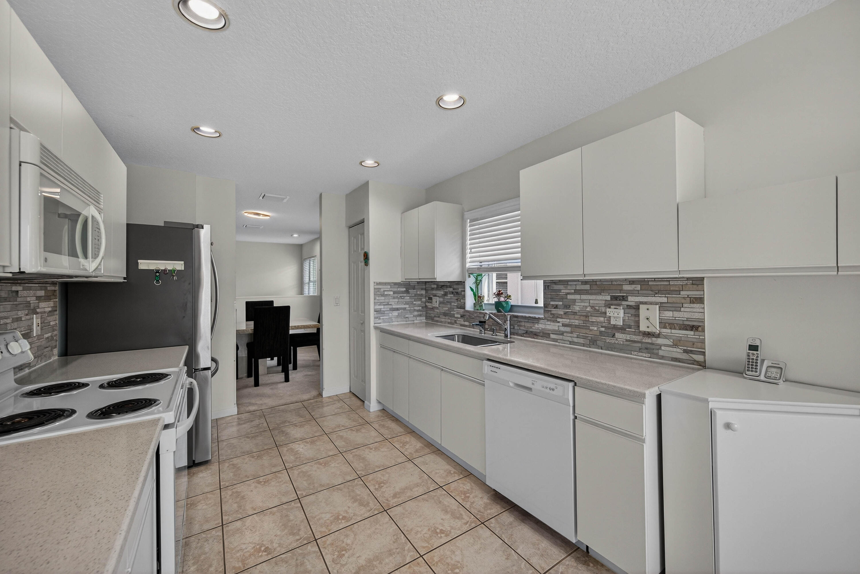 PALM ISLES I, II AND III CONDOS - Residential