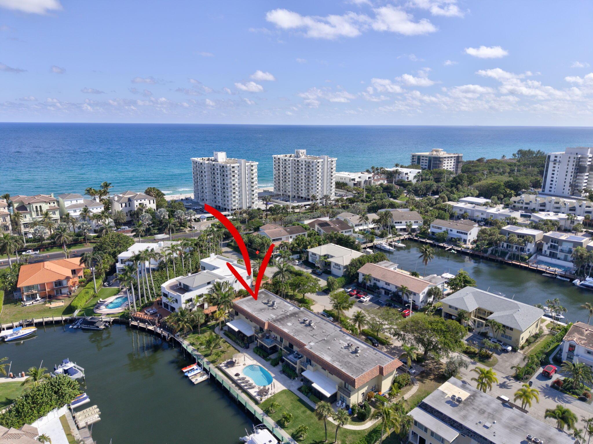 Discover this stunning corner townhome located in one of Florida's finest areas, featuring a coveted 25-foot boat slip right at your back doorstep. Nestled in a peaceful and serene community, this gem offers exclusive access to your exclusive entrance to the beach, making it a perfect retreat for beach lovers. This rarely available, spacious home boasts 4 bedrooms and a beautiful backyard that provides views of the tranquil canal. This Peaceful treasure in paradise is ideal for those seeking a coastal lifestyle with the ocean and nature just steps away! Community features a resort style pool.