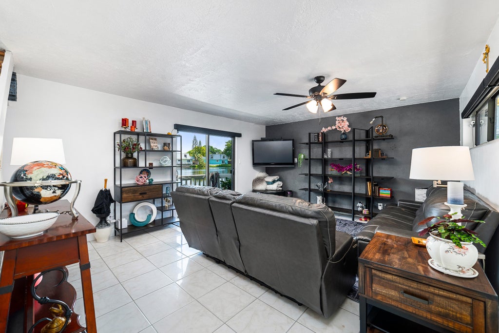 Photo of 1351 NE 40th Place, Oakland Park, FL 33334 (MLS # B26038440)