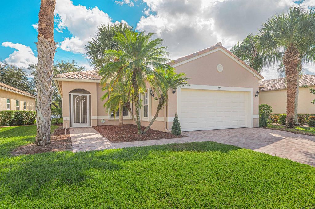 Photo of 309 NW Alana Avenue, Port Saint Lucie, FL 34986 (MLS # R10939853)