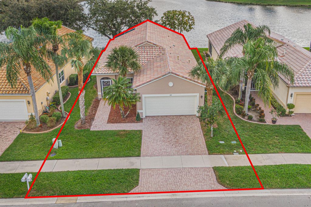 Photo of 309 NW Alana Avenue, Port Saint Lucie, FL 34986 (MLS # R10939853)