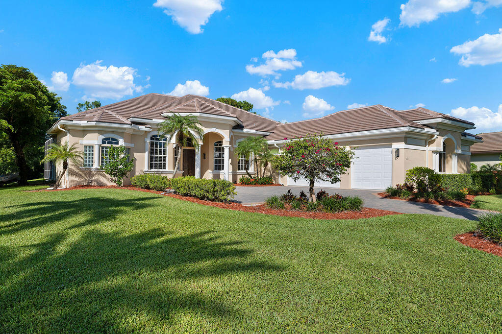 Custom 3 Bedroom plus den, 3 Bath, 3-car garage. Relax outside by the solar heated, screened pool and patio. High quality wood cabinetry and granite in kitchen and baths. Surround sound speakers, tinted windows, and plantation shutters throughout. Fountain highlights the new, resurfaced gorgeous pool and patio area. Located on one of the largest and most private lots in the guard-gated community of Cobblestone. The home is an ideal escape for sophisticated country living. The outdoor living space is both private and entertaining with a natural preserve behind the property. The spacious primary bedroom is accentuated with French doors leading to the pool/patio area with plantation shutters for privacy. Open floor plan with french doors to pool and patio.