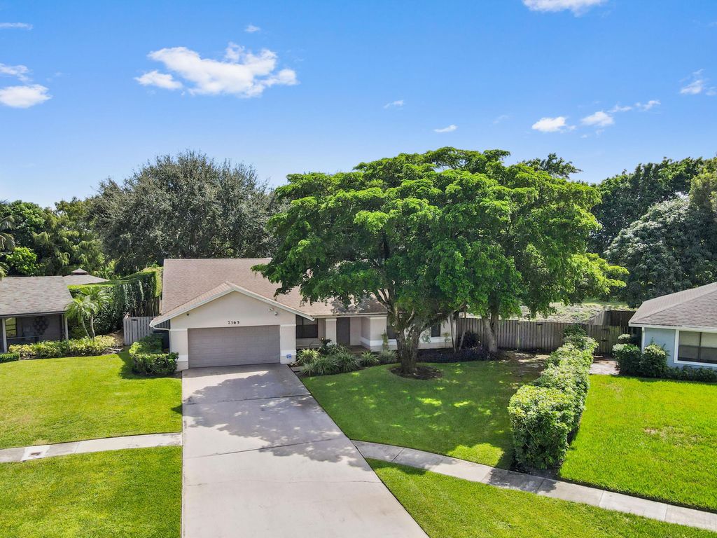Photo of 7365 Woodland Creek Lane, Lake Worth, FL 33467 (MLS # R11026545)