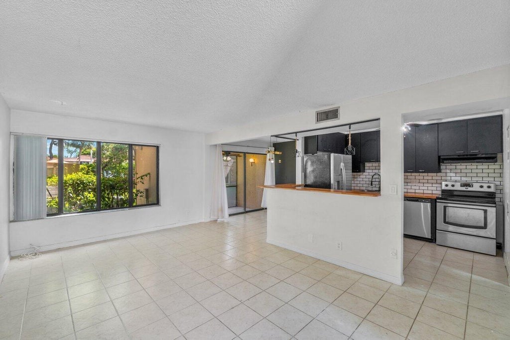 Photo of 1149 NW 13th Street #5, Boca Raton, FL 33486 (MLS # B26069818)