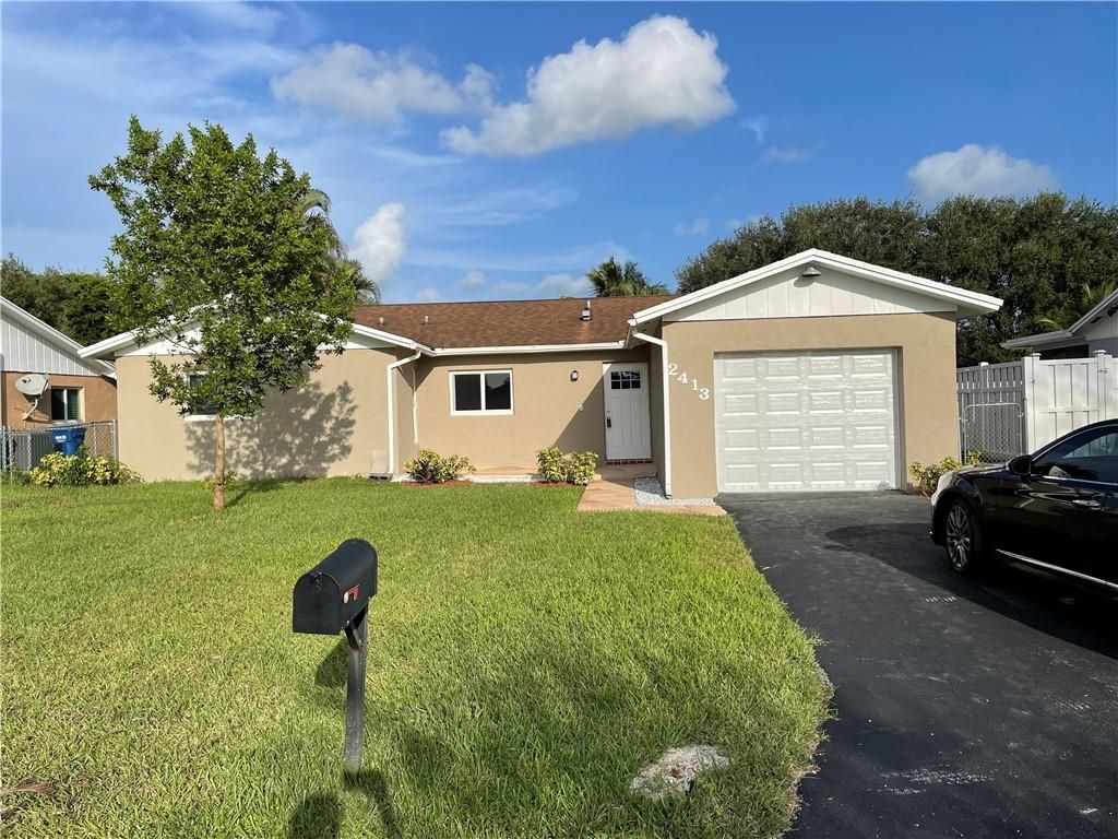 Photo of 2413 NW 98th Ter, Coral Springs, FL 33065 (MLS # F10303918)
