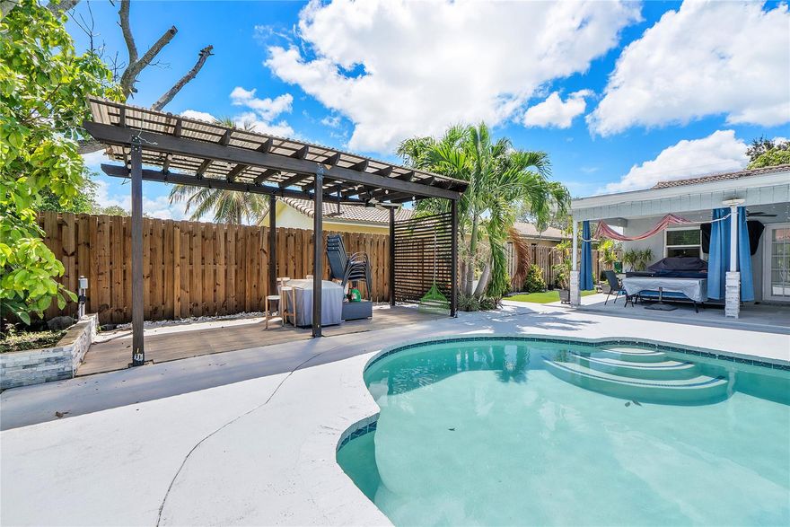 Unique opportunity for a Coral Springs Rental! This 3 Bedroom 2 Bath completely remodeled Pool home with a back yard Oasis is waiting for you! No HOA approval necessary! This home has Impact Windows throughout! The modern interior remodel has all new appliances, remodeled kitchen, bathrooms, floors, and accent wall for the Television.
The outdoor areas have been completely redone to create a backyard pool oasis complete with a Barbeque area Pergola next to the pool. Close to the Coral Springs SportsPlex and all that this award wining city has to offer.
NEW A/C UNIT  INSTALLED SEPTEMBER 13,2025!! Showings start September 15, 2025.