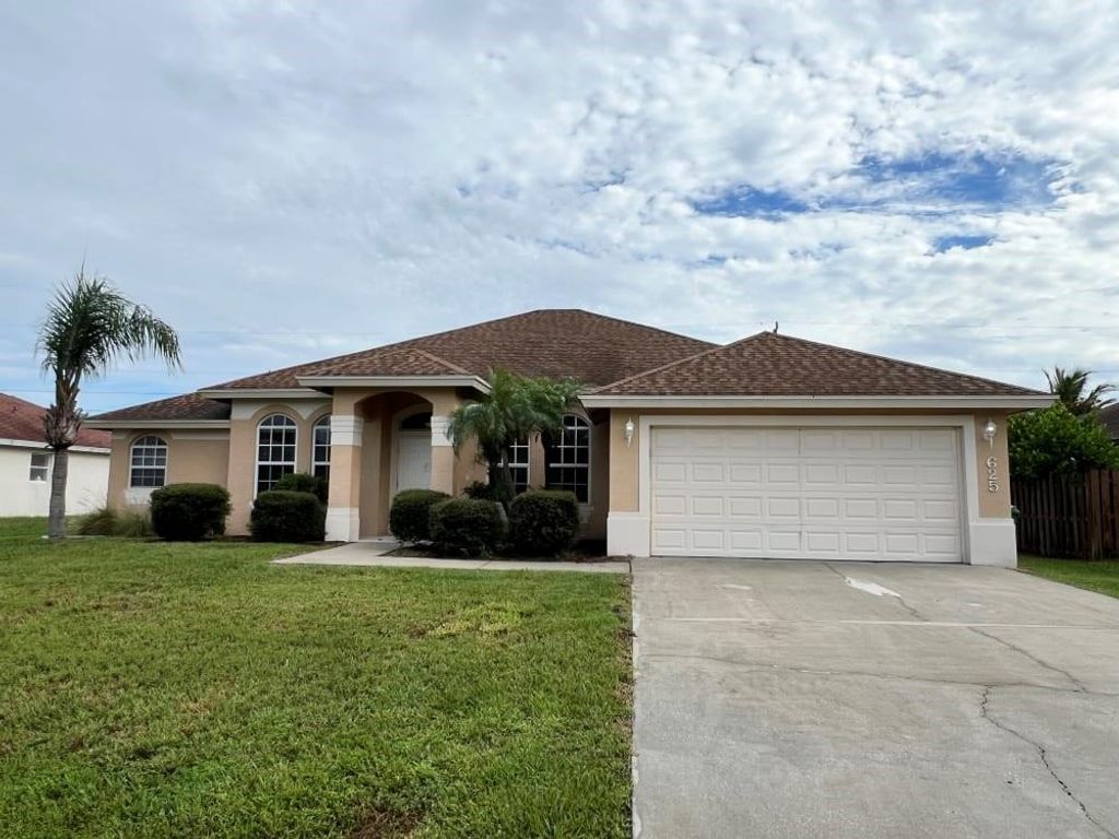 Photo of 625 SW Jacoby Avenue, Port Saint Lucie, FL 34953 (MLS # F10454635)