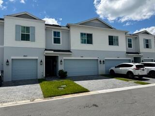 Welcome to this beautiful, move-in-ready townhouse located in the highly sought-after St. Lucie River Place community! This modern 3-bedroom, 2.5-bathroom home offers an ideal blend of comfort, style, and convenience. The 2 car garage not only offers room for your vehicles but also features a finished floor, adding a sleek, polished touch and provides extra space for hobbies or additional storage. This home is perfect for families, professionals, or anyone seeking a spacious, updated living space.