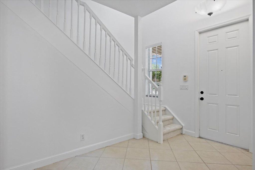 Photo of 605 Castle Drive, Palm Beach Gardens, FL 33410 (MLS # R10994847)