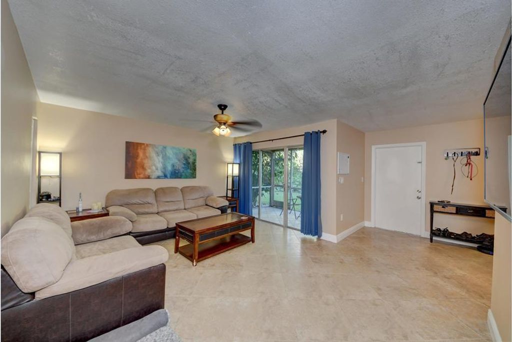 Photo of 12030 Alternate A1a #A5, Palm Beach Gardens, FL 33410 (MLS # R11104860)