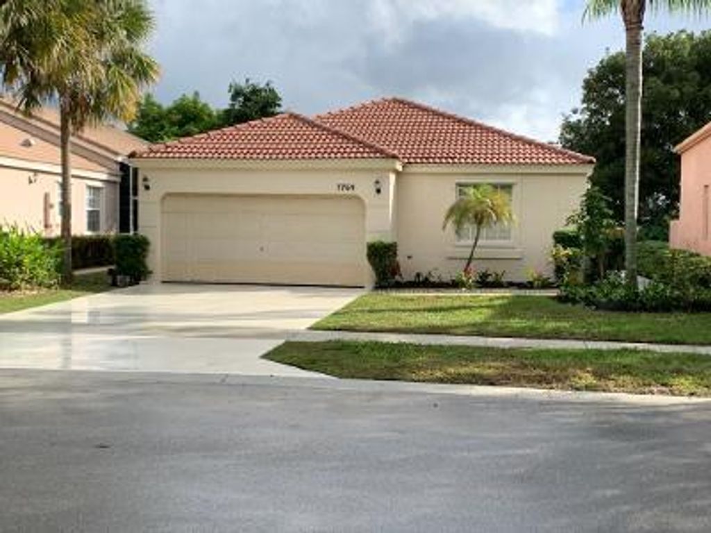 Photo of 7769 Rockport Circle Cir, Lake Worth Beach, FL 33467 (MLS # R10760492)