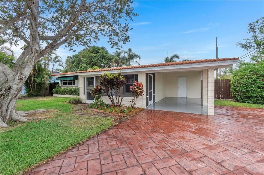 Recent price reduction. Ready to move in. This is the home you've been waiting for! The backyard includes a beautiful, marine grade wood deck which is perfect for dinner, or entertaining. The screened in front patio is a perfect place to unwind. No HOA. Bike to the beach, paddle board down the local waterways, or go to the dog park! Minutes from the beach, Boca Town Center, FAU, Mizner Park, places of worship, I-95 and much more. Schedule your private showing today!
