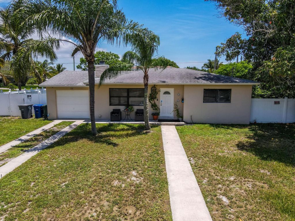 Photo of 755 Greenbriar Drive, Lake Park, FL 33403 (MLS # R10898043)