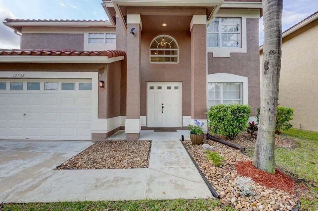 Photo of 10758 Lake Jasmine Drive, Boca Raton, FL 33498 (MLS # B26019097)