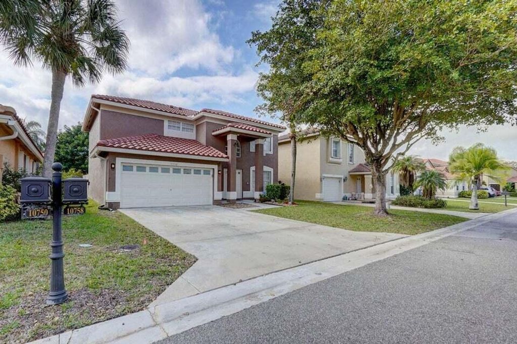 Photo of 10758 Lake Jasmine Drive, Boca Raton, FL 33498 (MLS # B26019097)