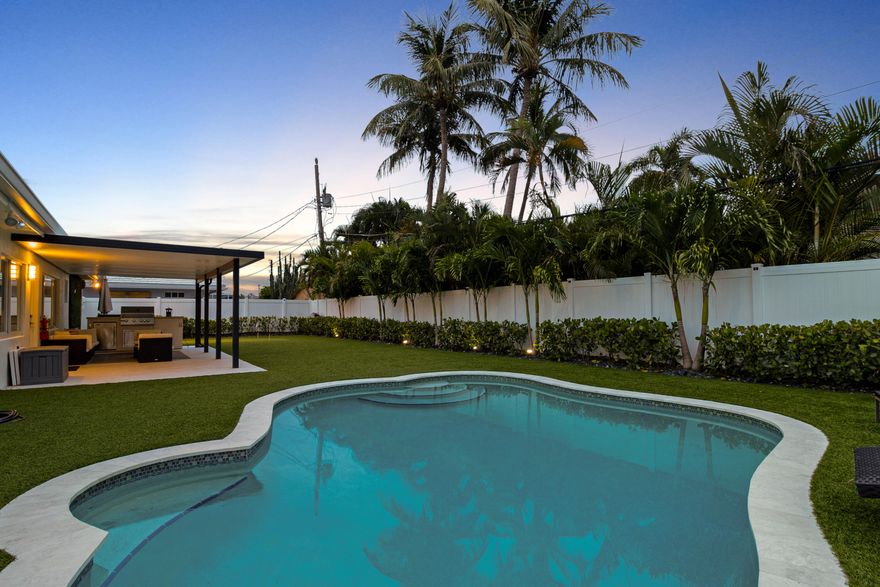 SELLER WILLING TO OFFER A $10,000 CREDIT AT CLOSING! Live the Lighthouse Point lifestyle just steps from Cap's Place and Frank McDonough Park! This fully SOLAR-powered (owned solar) 4 bed, 4 FULL bath home blends cutting-edge technology with elevated coastal comfort, boasting over 2,600 sqft of living space, ideal for entertaining. The chef's kitchen stuns with a leathered honed quartz island, 8-burner GAS RANGE (120-gallon tank), oversized 66'' built-in refrigerator and freezer, MIELE BUILT-in COFFEE system, and wine fridge. Bright, open-concept living areas feature white oak engineered hardwood flooring and a sleek ventless bioethanol fireplace. Dual A/Cs (2024 & 2011), two tankless water heaters (2021), IMPACT WINDOWS, updated electrical panels and PVC PLUMBING to ensure peace of mind. Love the furniture too? Furniture can be included in the sale for a turnkey experience, if desired. Outside, enjoy a resort-style SOUTH FACING EXPOSURE backyard with premium synthetic turf, a 3-hole putting green, HEATED saltwater pool, newly insulated pergola, and full outdoor kitchen. Home includes 3 high-capacity backup batteries (up to 4 days of off-grid power), and EV charging station (220V). Double primary shower, beautifully updated baths throughout, and an expansive layout complete this exceptional offering in one of Lighthouse Point's most desirable walkable pockets.  

The home has been a successful vacation rental and can easily continue generating income if you're looking for an investment or part-time use.