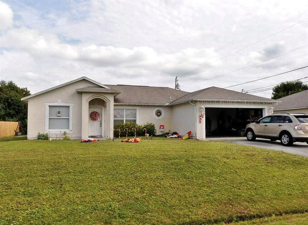 Photo of 4409 SW Masefield Street, Port Saint Lucie, FL 34953 (MLS # R10722578)