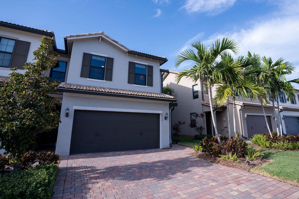 Photo of 8217 Cadre Noir Road, Lake Worth, FL 33467 (MLS # B26068005)